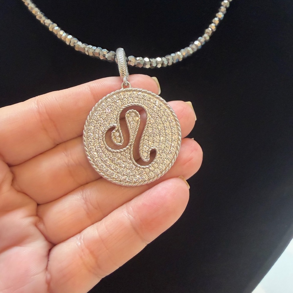 Judith Ripka Silver 925 and Diamonique zodiac pendant/enhancer - Leo